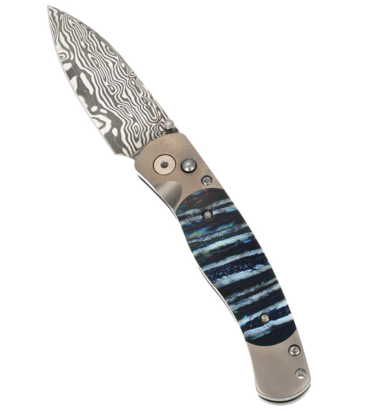 El Rey – Damasteel Bi-Frost with Blue Fossilized Mammoth Tooth & Titanium Frame